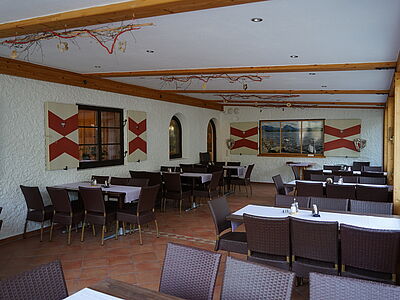 Interior view of the restaurant with wooden seating